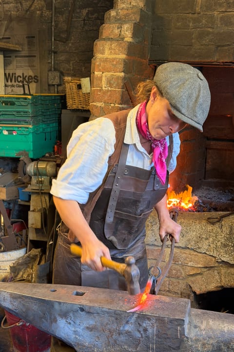 A blacksmith working at the forge — the kind of skilled maker Banbury's future economy could be built around