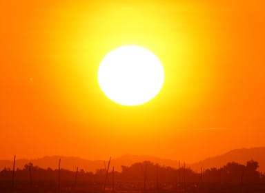 Residents on a hot urban street during a summer heatwave in Banbury
